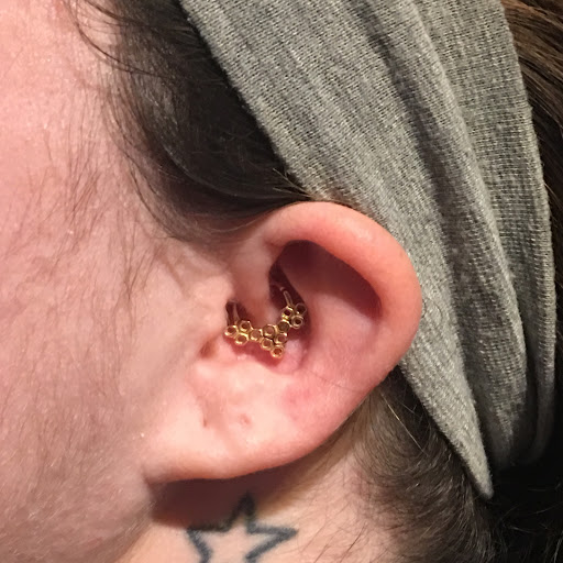 Explore chest plate tattoo ideas, creative tattoo ideas in Bloomington, available at Evil by the Needle Custom Tattoo and Piercing Studio