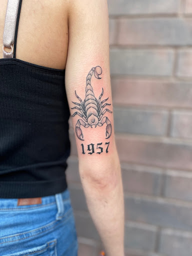 Explore brown pride tattoo ideas, creative tattoo ideas in Peoria, available at Modern Ink Tattoo