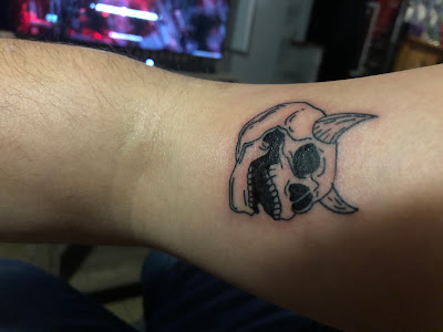 Black Octopus tattoo à Lure