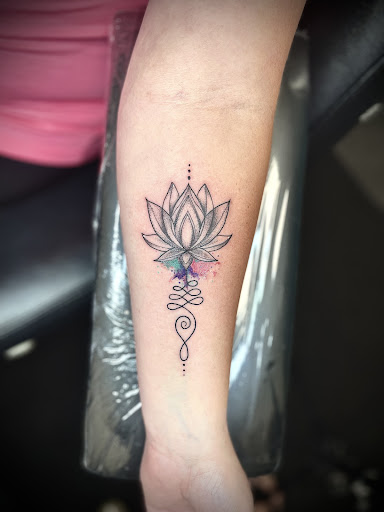 Explore kiss band tattoo ideas, creative tattoo ideas in Tannersville, available at Sacred Ink Studio