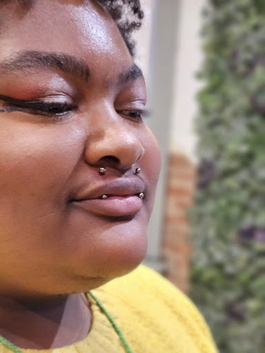 Explore kissing lips tattoo ideas, creative tattoo ideas in Covington, available at Runestone Piercing, LLC