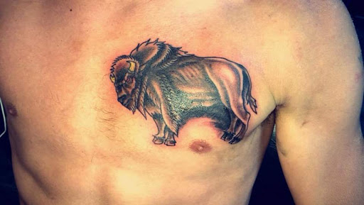 Explore camo tattoo ideas, creative tattoo ideas in Buffalo, available at Signature Ink