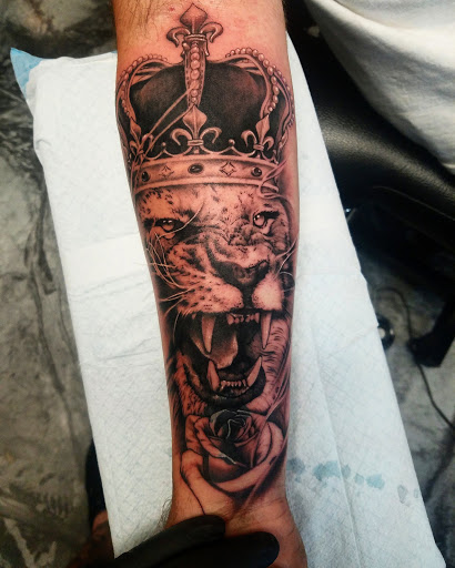 Explore cm punk tattoo ideas, creative tattoo ideas in Riverview, available at 9-Line Tattoo