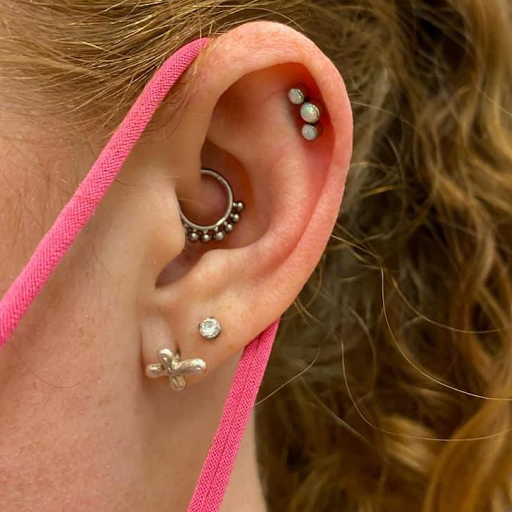 Explore hand skull tattoo ideas, creative tattoo ideas in Aledo, available at Elevated Tattoo & Piercing