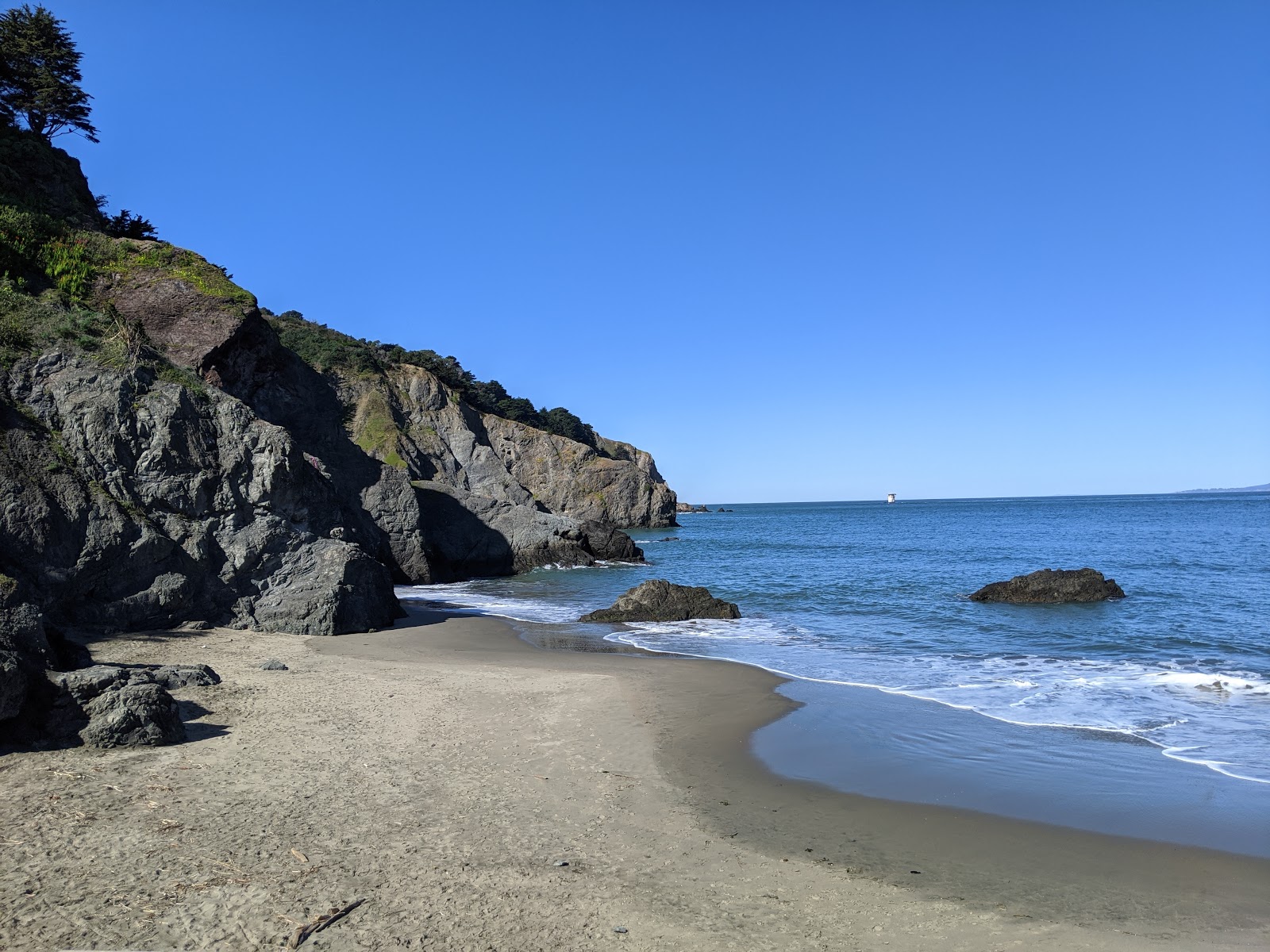 Foto av China Beach med beige sand yta