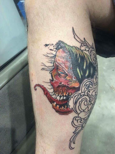 Explore wolf neck tattoo ideas, creative tattoo ideas in Goose Creek, available at Red Kirin Tattoo