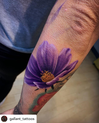 Explore hand name tattoo ideas, creative tattoo ideas in Fort Wayne, available at Grade A Tattoos and Body Piercing