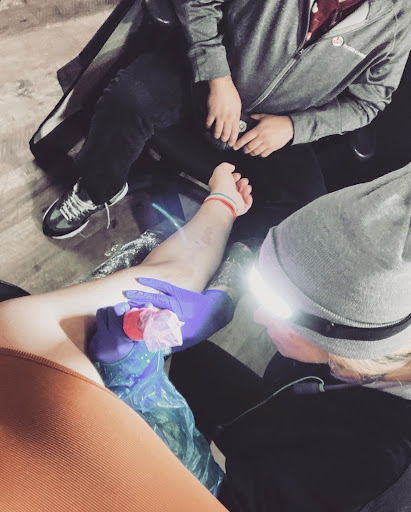 Explore thyroid tattoo ideas, creative tattoo ideas in East Providence, available at Memento Tattoo RI