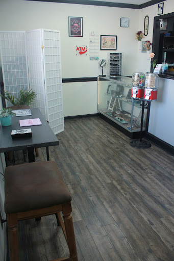 Explore tattoo ideas for covering up name, creative tattoo ideas in Warner Robins, available at Atomic Valkyrie