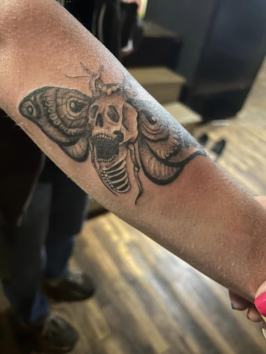 Explore sunlight tattoo ideas, creative tattoo ideas in Wisconsin Dells, available at Twisted Dimensions Tattoo Studio