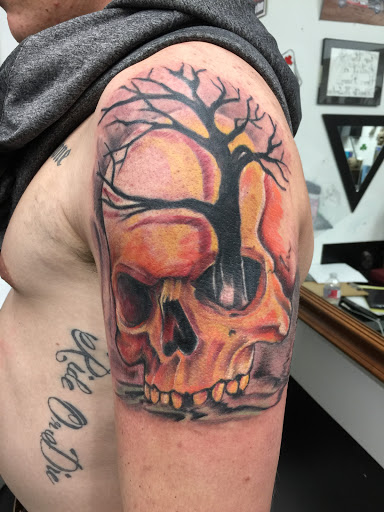 Explore rolling stones tattoo ideas, creative tattoo ideas in Lawton, available at Impact Ink Tattoo Studios