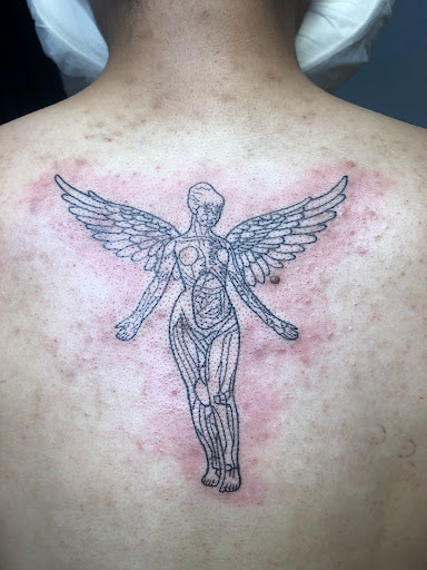 Explore mens thumb tattoo ideas, creative tattoo ideas in Englewood, available at Point of Entry Tattoo