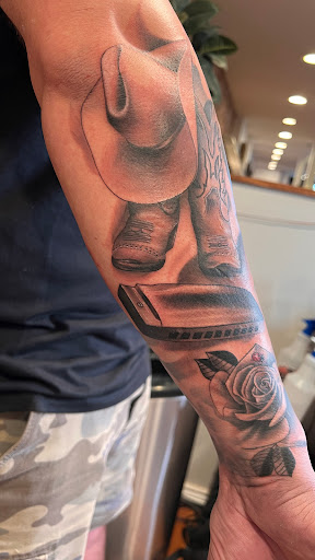 Explore dahlia tattoo ideas, creative tattoo ideas in Ogden, available at Legacy Tattoo