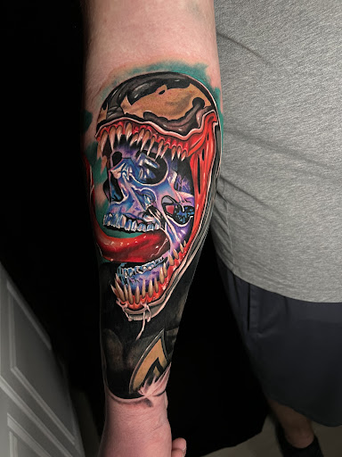 Find heartbeat tattoo ideas for your next unique tattoo in Matthews at Visual Impact Tattoo Gallery