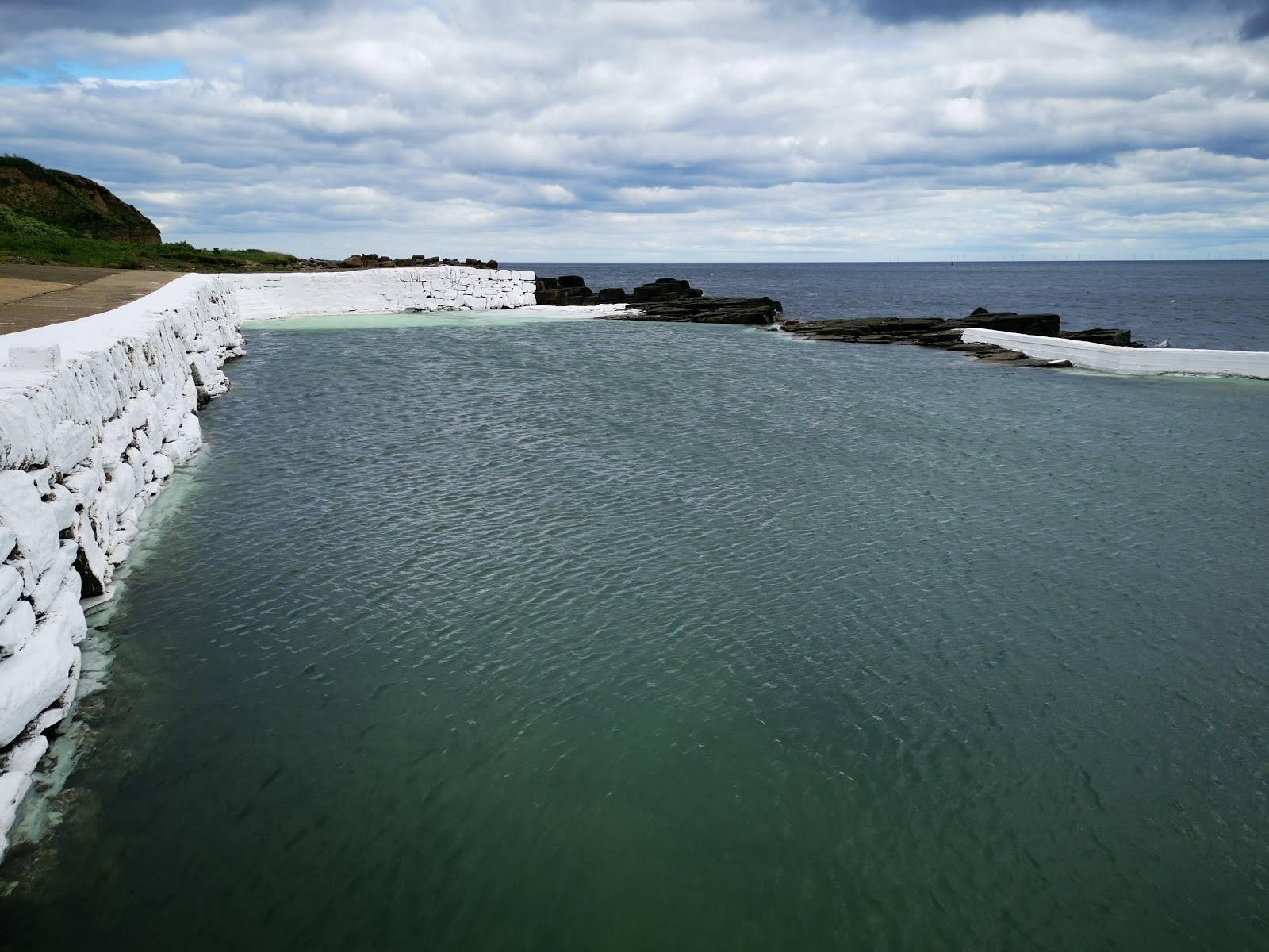 Foto av North Baths Beach med turkos rent vatten yta
