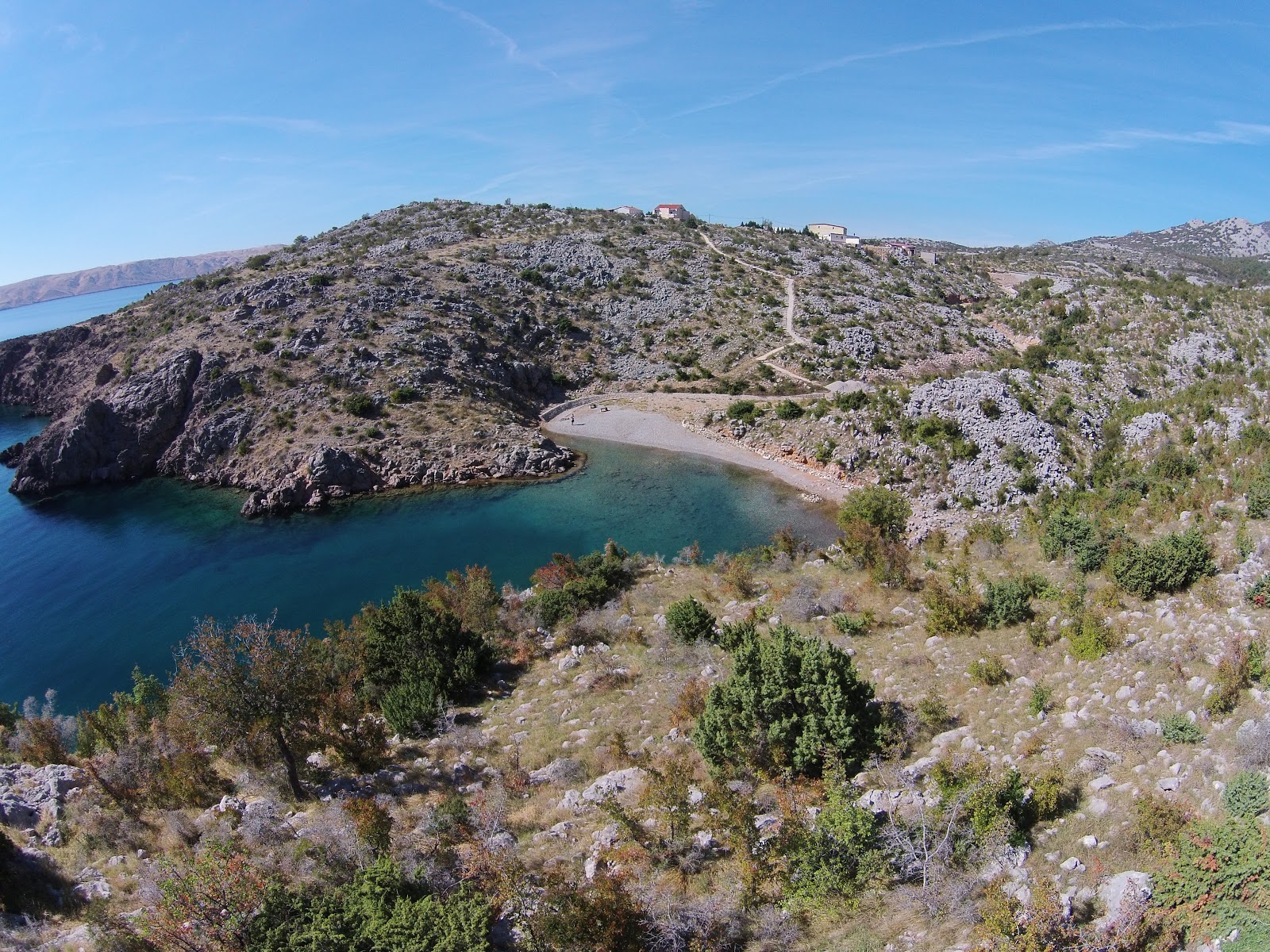 Foto von Cesarica beach mit grauer kies Oberfläche