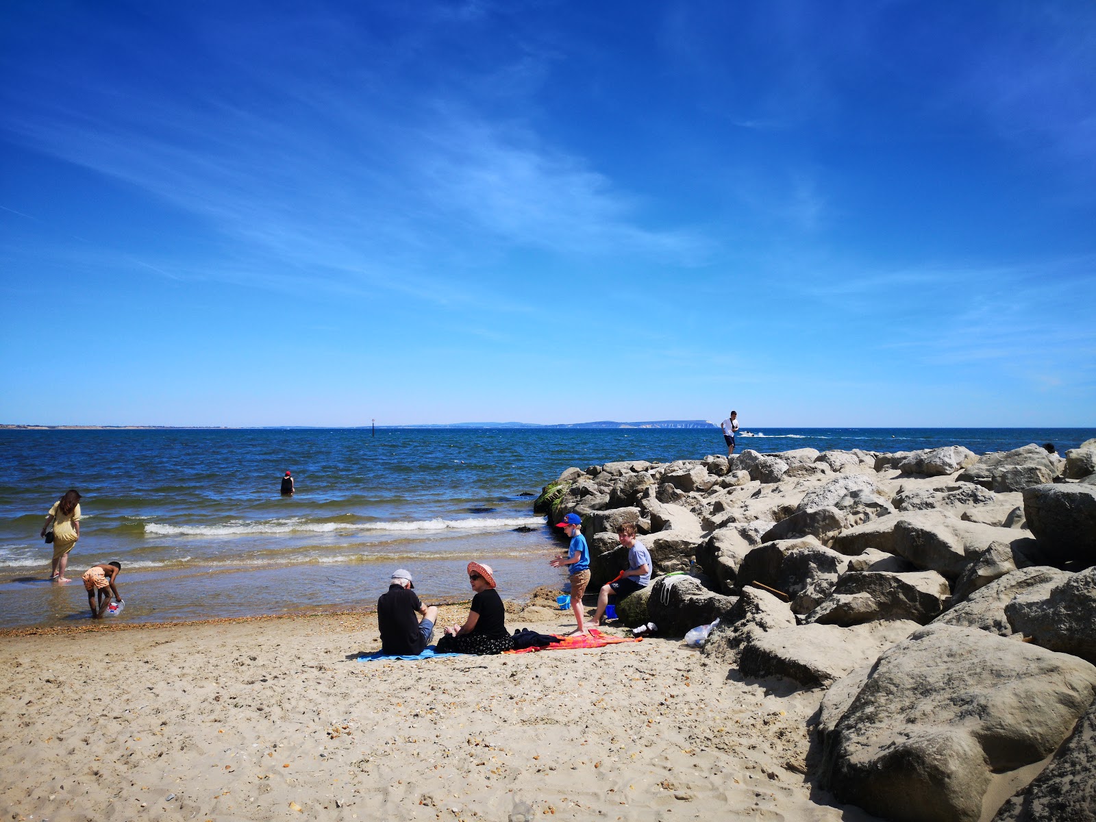 Fotografija Plaža Mudeford in naselje