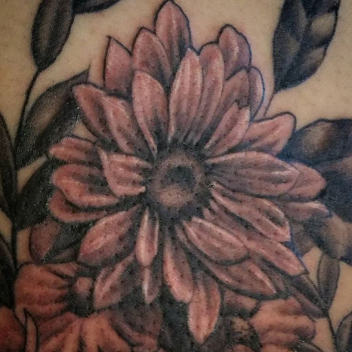 Explore front of neck tattoo ideas, creative tattoo ideas in Oxnard, available at Downtown Tattoo & Body Piercing