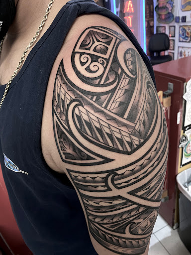 Explore tattoo ideas leg, creative tattoo ideas in Honolulu, available at Sacred Art Tattoo Waikiki