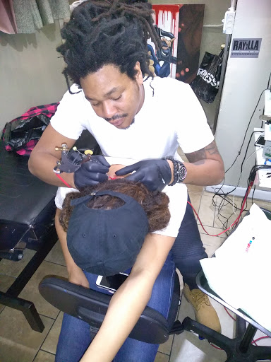 Explore black heart heart tattoo cover up ideas, creative tattoo ideas in Atlanta, available at Iron Palm Tattoos & Body Piercing Atlanta