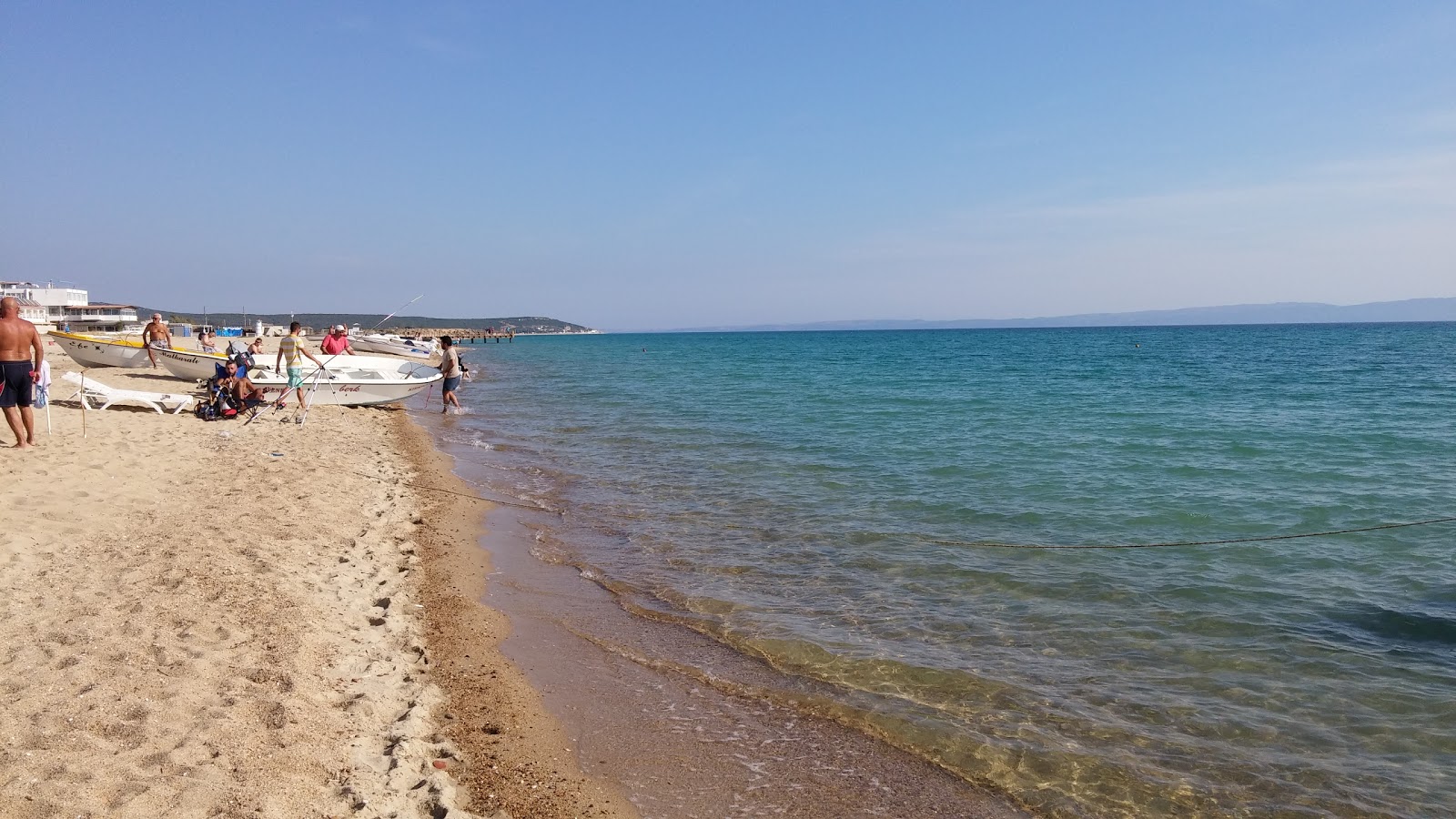 Foto di Spiaggia di Erikli con una superficie del acqua blu