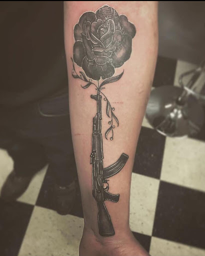 Explore tom petty tattoo ideas, creative tattoo ideas in Stevens Point, available at Black Rabbit Tattooing