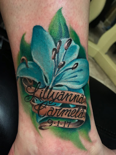 Explore new jersey tattoo ideas, creative tattoo ideas in Mantua, available at Evolution Tattoo Studio