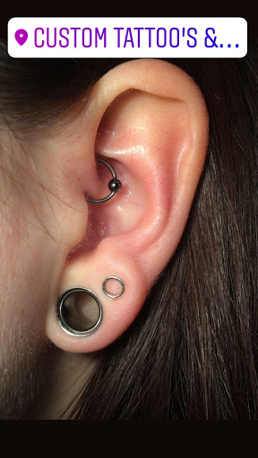 Explore clover tattoo ideas, creative tattoo ideas in Elko, available at Custom Tattoos and Body Piercing Studio