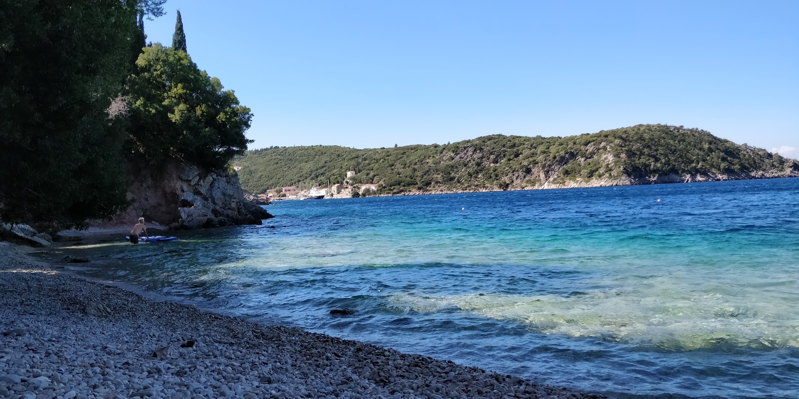 Fotografie cu Kantina beach II cu o suprafață de apa pură turcoaz