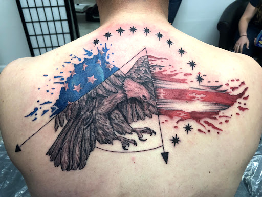 Explore chest tattoo lettering ideas, creative tattoo ideas in San Antonio, available at Twisted Tattoo