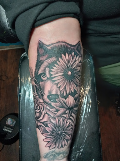 Explore mom tattoo ideas for guys, creative tattoo ideas in Longview, available at Anchor Down Tattoo and Piercing