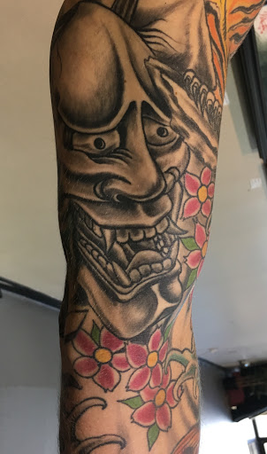 Explore small cardinal tattoo ideas, creative tattoo ideas in Houston, available at Rose & Dagger Tattoo