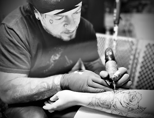 Find inner lip tattoo ideas for your next unique tattoo in Lanoka Harbor at Fine Lines Body Art Studio
