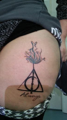 Explore carnage tattoo ideas, creative tattoo ideas in Fort Myers, available at Tiger Lotus Tattoo and Piercing