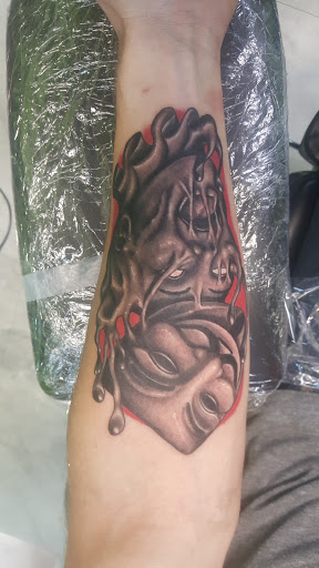 Explore animal skull tattoo ideas, creative tattoo ideas in Destin, available at Atomic Frog Tattoo