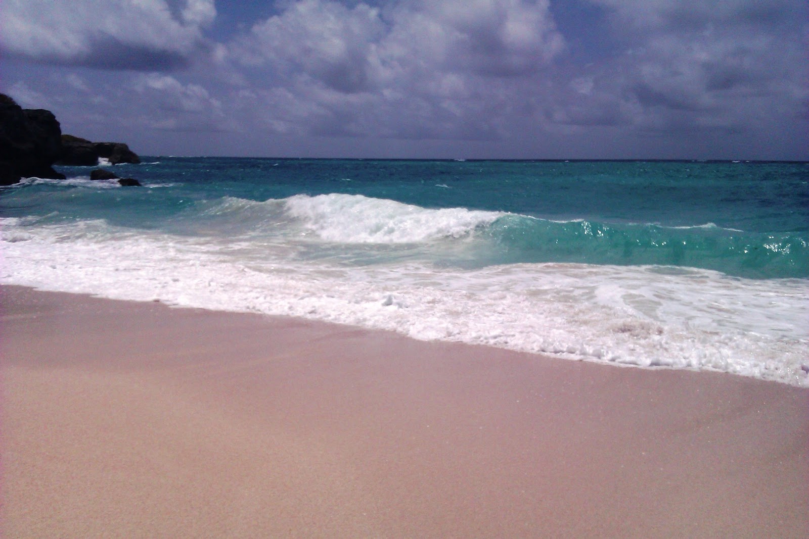 Photo of Deborah Bay with turquoise water surface