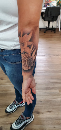 Explore daffodil tattoo ideas, creative tattoo ideas in Fresno, available at Happy Client Tattoo