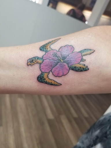 Explore time flies tattoo ideas, creative tattoo ideas in Kailua Kona, available at Lady Luck Tattoo & Body Piercing