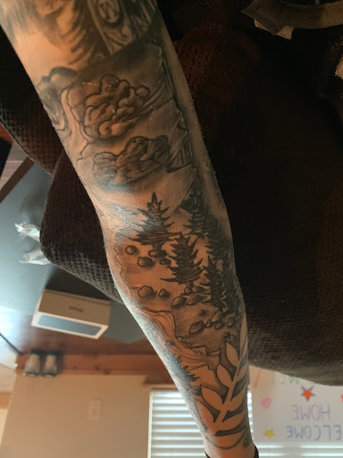 Find small joker tattoo ideas for your next unique tattoo in Lawton at Impact Ink Tattoo Studios