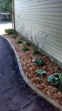 Lawn Works & Landscape - Photo 5 - Car repair in , Fargo