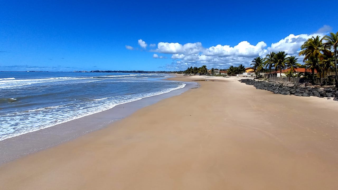 Foto von Praia do Norte mit feiner beiger sand Oberfläche