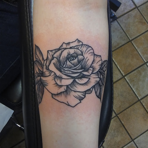 Explore rattlesnake tattoo ideas, creative tattoo ideas in Warren, available at Tattoo X