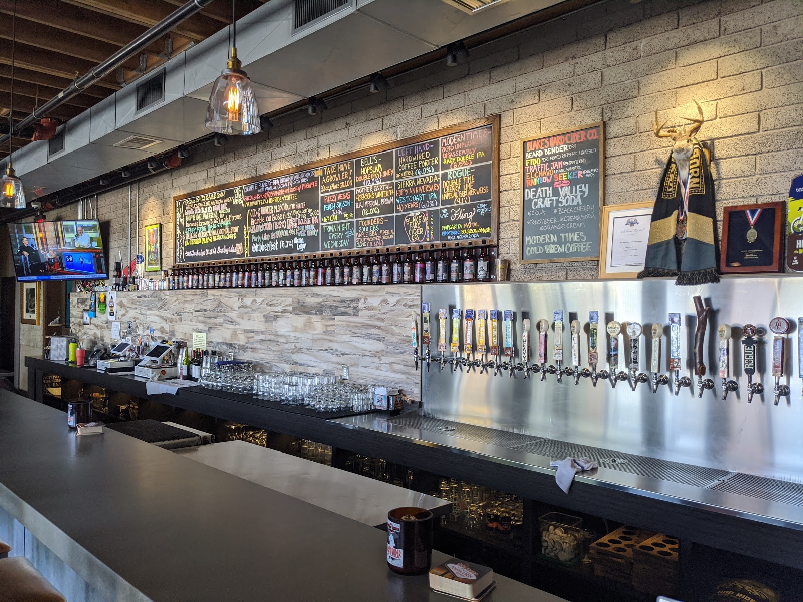A pint of beer on a bar