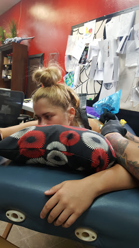 Tattoo Shop «Divine Torture», reviews and photos, 3223 Curry Ford Rd, Orlando, FL 32806, USA