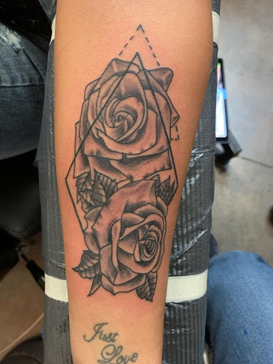 Explore tattoo ideas hand wrist, creative tattoo ideas in Elkhart, available at Divine Tattoo and Body Piercing