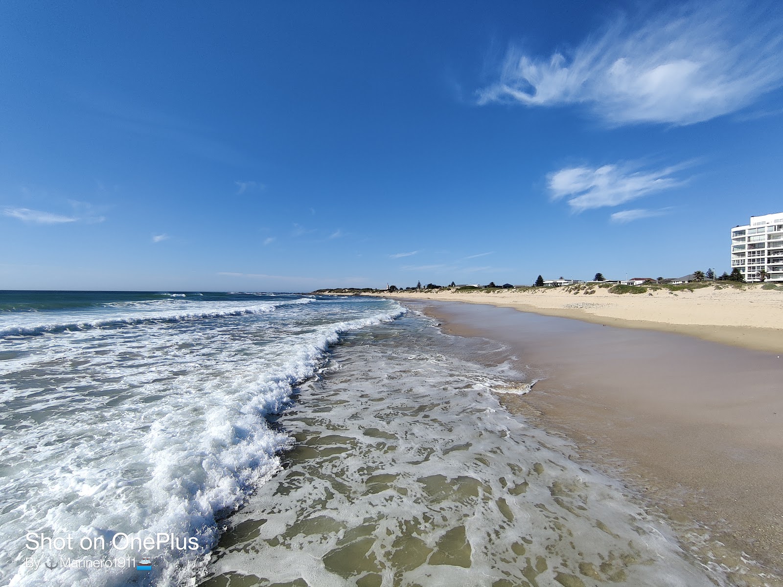 Fotografija Pollok beach z dolga ravna obala