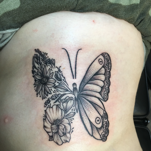 Explore rip tattoo ideas, creative tattoo ideas in Warner Robins, available at Untold Pain Tattoo Studio