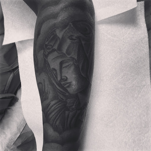 Find spinal cord tattoos ideas for your next unique tattoo in New Paltz at High Dive Tattoo & Piercing