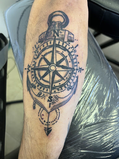 Explore hand skull tattoo ideas, creative tattoo ideas in Moultrie, available at Ink Addiction Tattoo Moultrie
