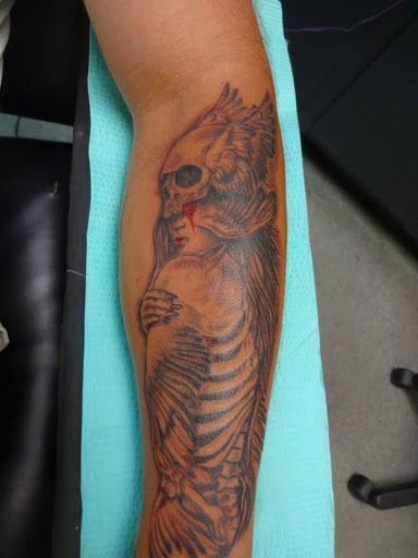 Explore butterfly semicolon tattoo ideas, creative tattoo ideas in Huntsville, available at Kreations Tattoos & Body Piercing